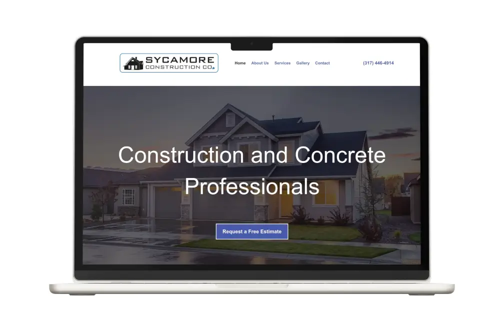 A laptop displaying a new website for a construction and concrete company.